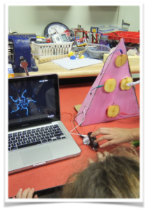 Students in the Electronics class make a game for grade 2 students to enjoy.